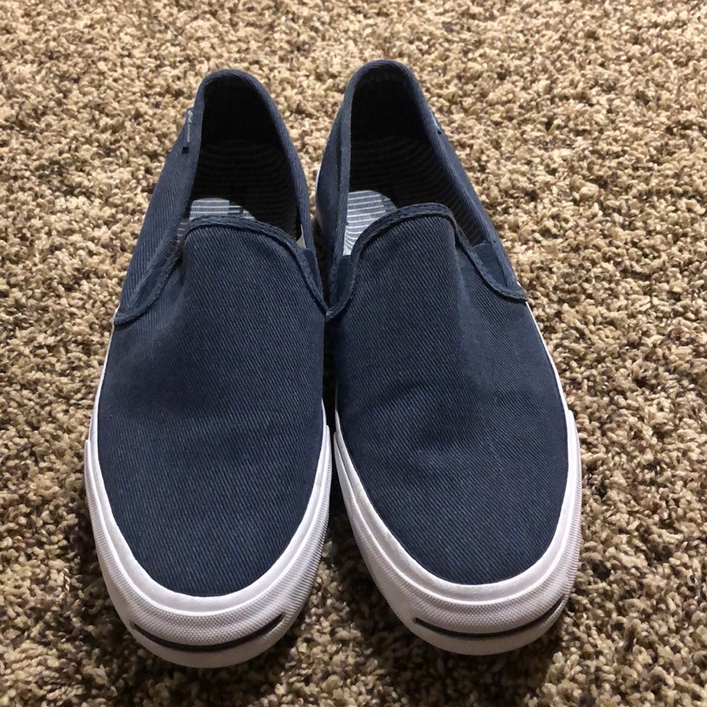 Woman’s size 10.5 slip on converse *NEVER WORN*